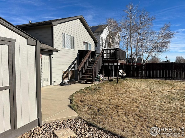 view of yard featuring a wooden deck