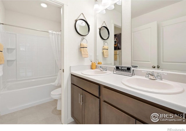 full bathroom with shower / bath combo, toilet, tile patterned flooring, and vanity