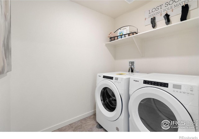 laundry area featuring washing machine and dryer