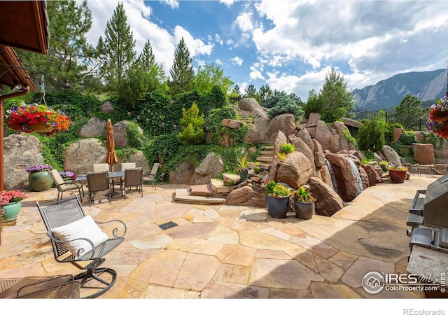 view of patio featuring a mountain view