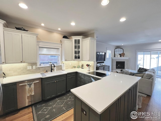 kitchen featuring dishwasher, white cabinetry, black electric cooktop, sink, and gray cabinets