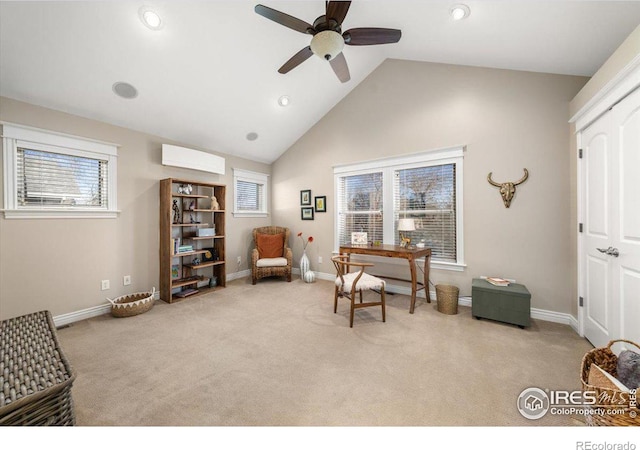 office space with ceiling fan, high vaulted ceiling, light carpet, and a wall mounted air conditioner