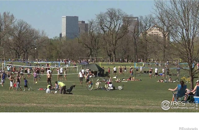 view of home's community featuring a lawn