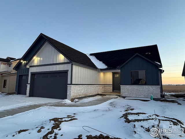 view of front of property with a garage