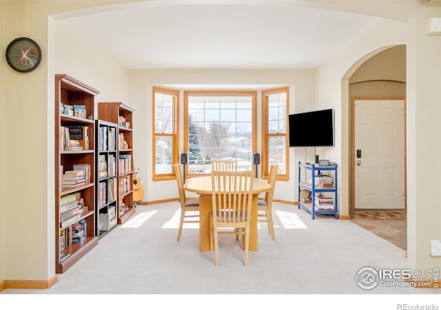 view of carpeted dining area