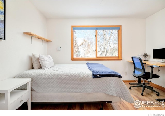 bedroom featuring wood-type flooring