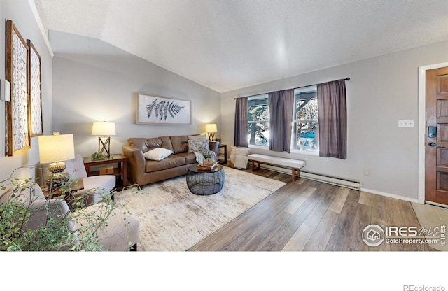 living room featuring lofted ceiling, wood-type flooring, a baseboard radiator, and a textured ceiling