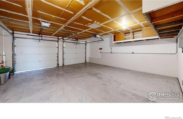 garage featuring a garage door opener