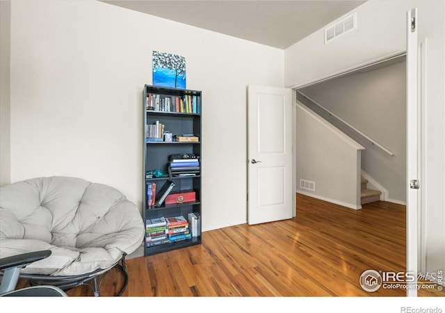 living area featuring hardwood / wood-style flooring