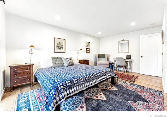 bedroom featuring hardwood / wood-style flooring