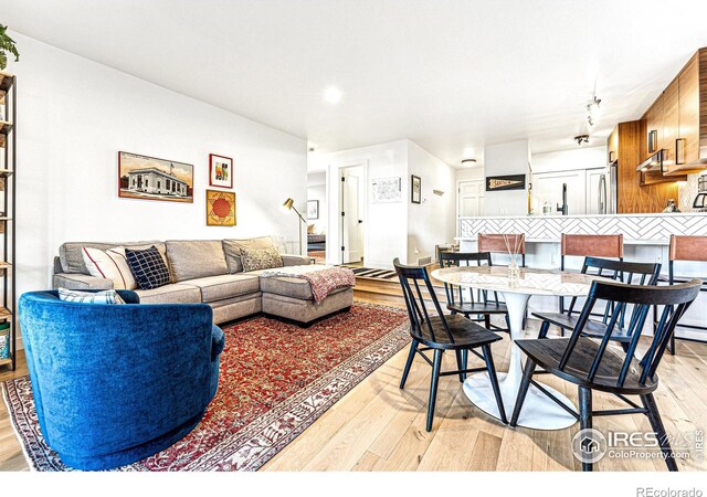 living room featuring light wood-type flooring