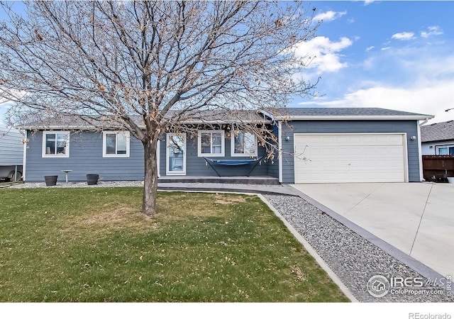 single story home featuring a garage and a front lawn