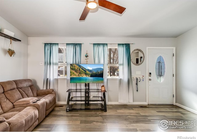 entrance foyer with hardwood / wood-style floors and ceiling fan