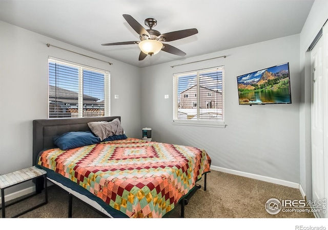 carpeted bedroom featuring ceiling fan