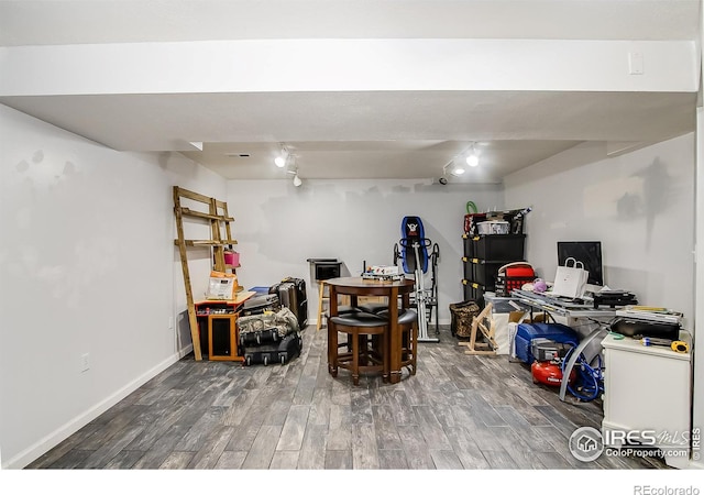 basement with wood-type flooring