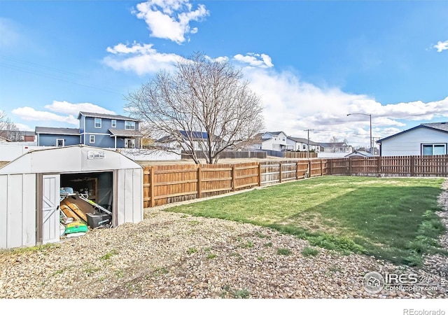 view of yard with a shed