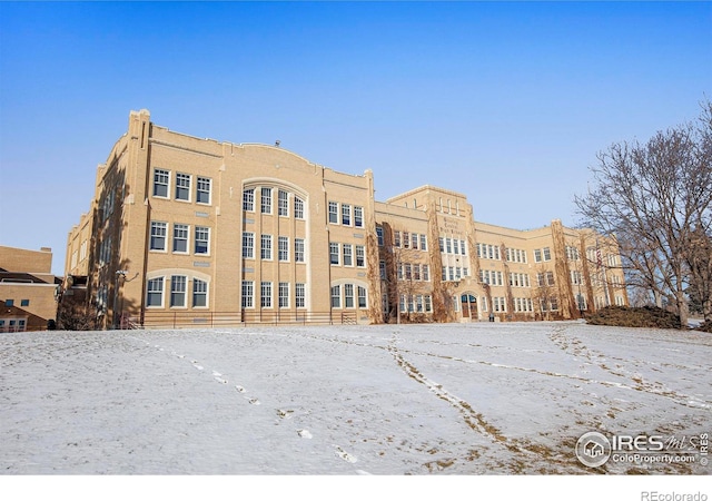 view of snow covered building