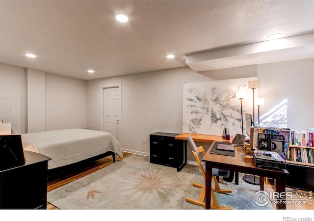 bedroom featuring light carpet