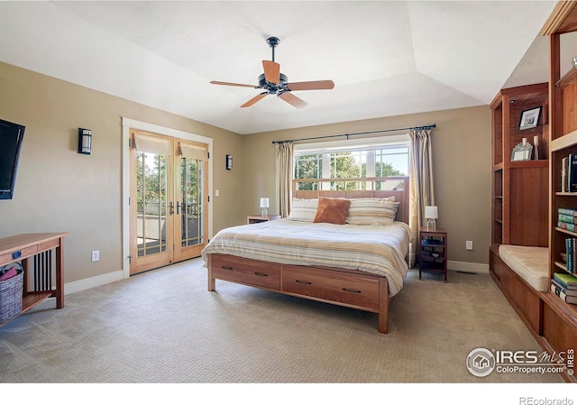 carpeted bedroom with multiple windows, access to exterior, ceiling fan, and french doors