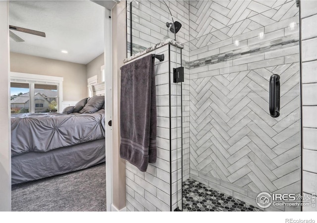 bathroom with tiled shower