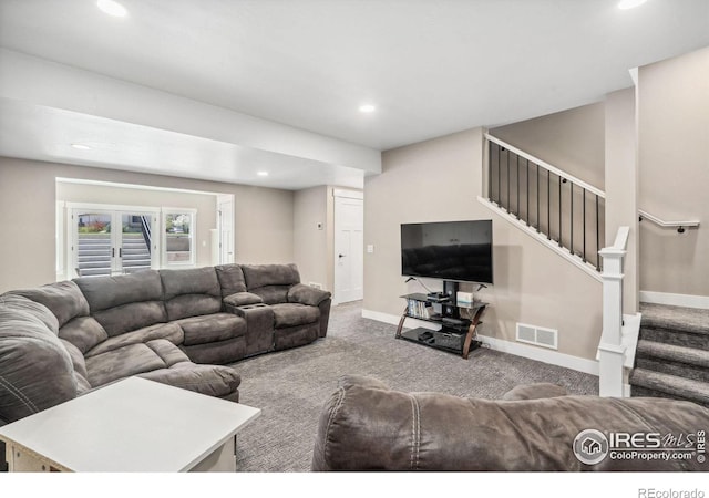 living room featuring carpet floors