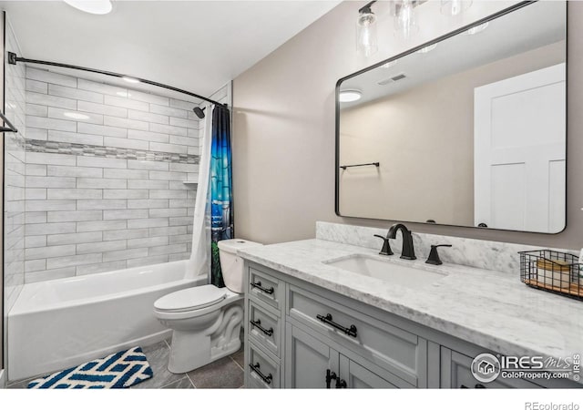 full bathroom with tile patterned flooring, vanity, shower / tub combo with curtain, and toilet