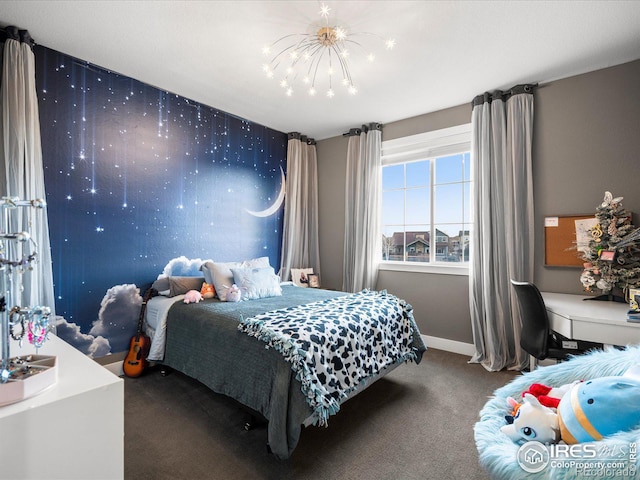 bedroom featuring carpet flooring and an inviting chandelier