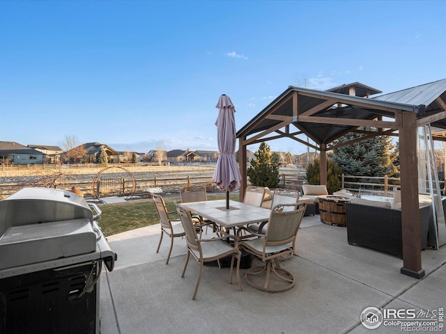 view of patio with a gazebo, a grill, and outdoor lounge area