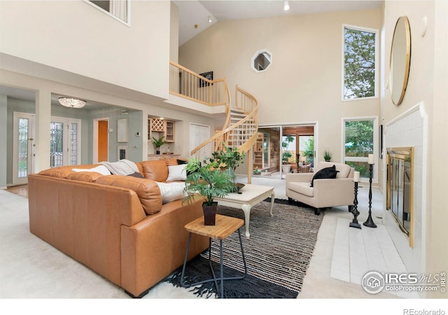 living room with a towering ceiling