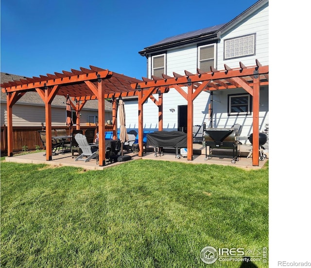 view of yard featuring a pergola and a patio