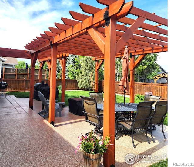 view of patio featuring a pergola