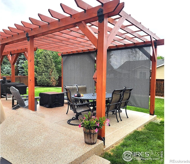 view of patio / terrace featuring a pergola and a hot tub