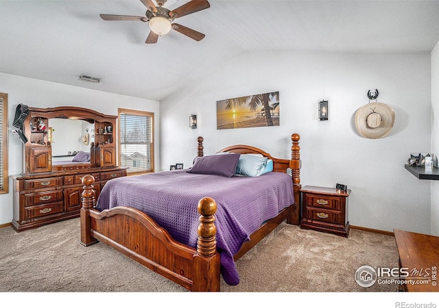 carpeted bedroom with lofted ceiling and ceiling fan