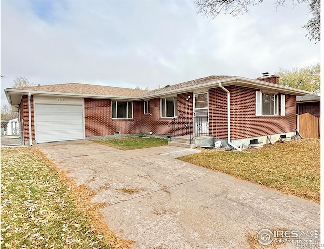 single story home featuring a garage and a front yard