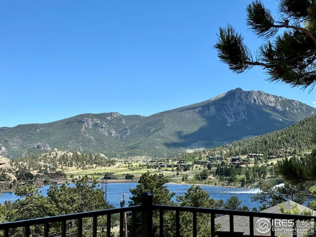 property view of mountains featuring a water view