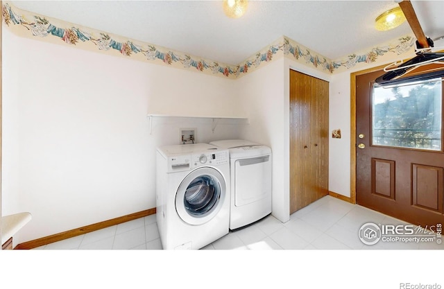 washroom featuring independent washer and dryer