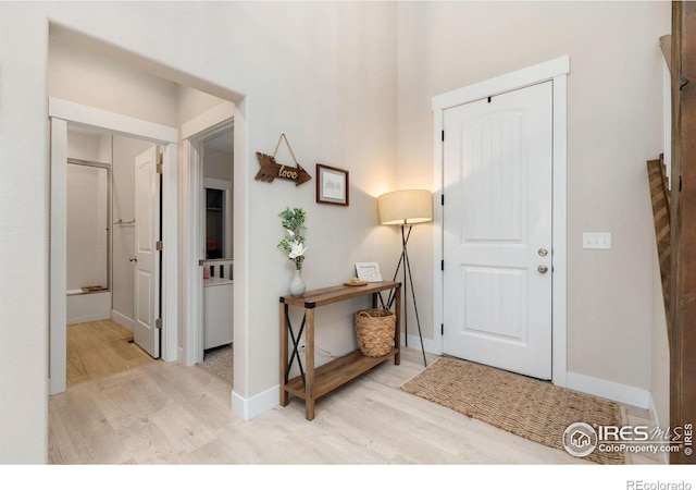 foyer entrance featuring light hardwood / wood-style floors