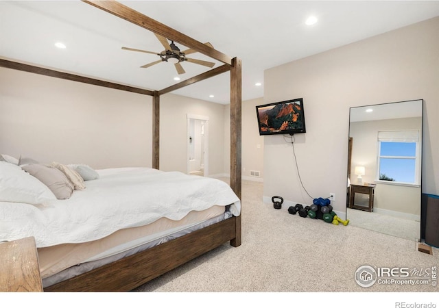 bedroom featuring light colored carpet and ceiling fan