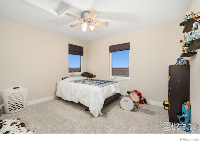 carpeted bedroom with ceiling fan