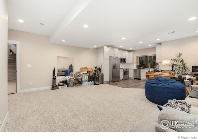 living room with light carpet