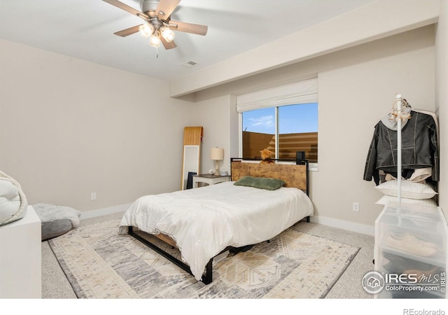 carpeted bedroom with ceiling fan