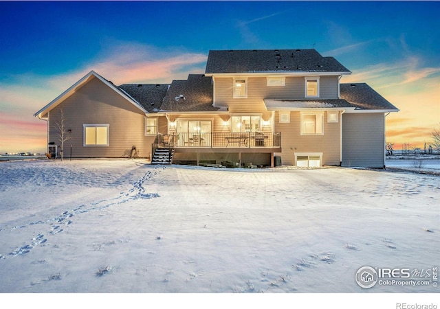 view of snow covered property