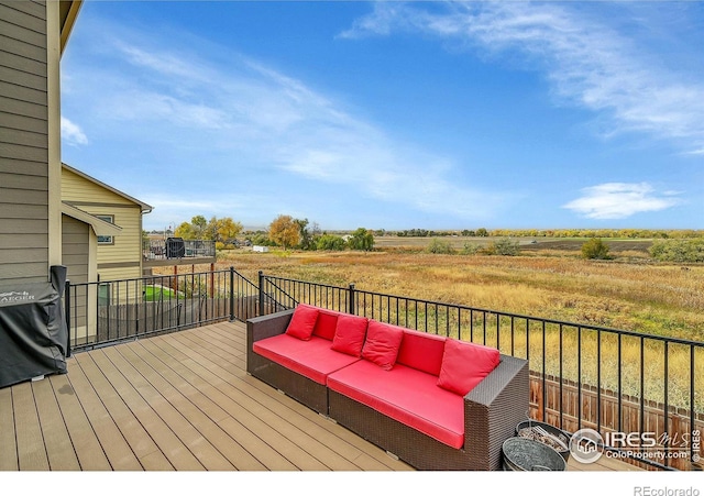 deck featuring outdoor lounge area