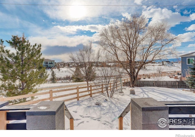 view of snow covered patio