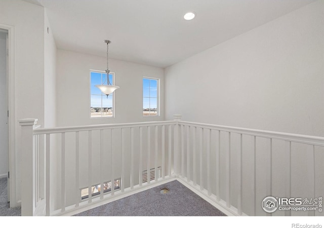 empty room featuring carpet floors