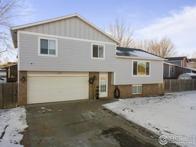 tri-level home featuring a garage