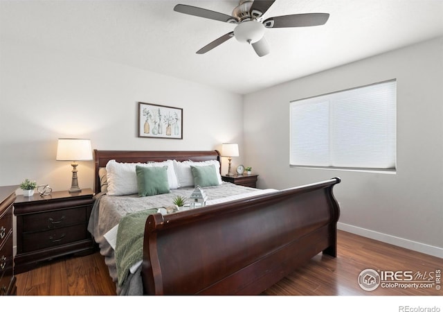 bedroom featuring dark wood-type flooring and ceiling fan