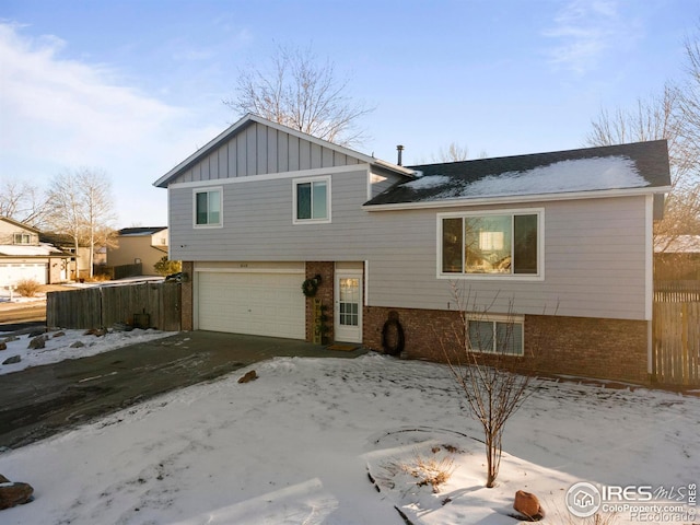 split level home featuring a garage