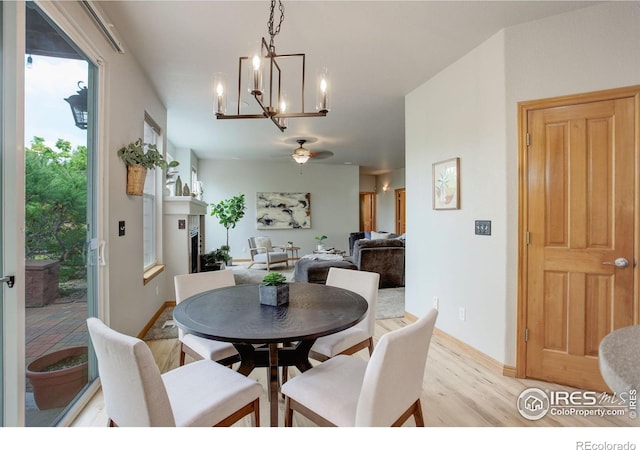 dining area with light hardwood / wood-style flooring