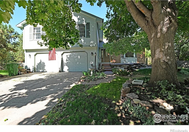 view of front of property featuring a garage